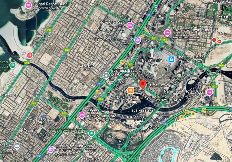 Completed luxury apartment interior in Dubai with panoramic city views, bright airy open-plan living space